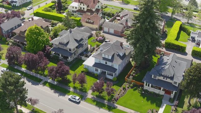 Aerial drone flyover of a suburban neighborhood