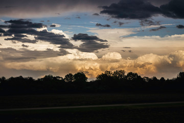 Cumulonimbus Clouds of a Massive Supercell Thunderstorm near Sunset in May