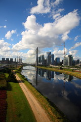 Fototapeta premium Octavio Frias de Oliveira Suspension Bridge over the Pinheiros River and Sao Paulo city skyline, Brazil