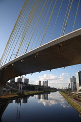 Octavio Frias de Oliveira Suspension Bridge over the Pinheiros River and Sao Paulo city skyline, Brazil