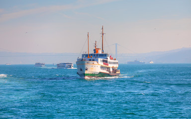 Water trail foaming behind a passenger ferry boat in Bosphorus, Istanbul, Turkey