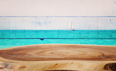 background Image of vintage table in front of old summer tropical decorative wooden wall. ready for product display