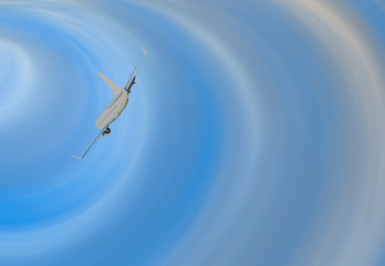 An airplane shakes during turbulence flying air hole - A plane spinning in round clouds - Front...
