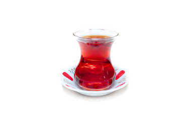 Glass of Turkish tea isolated on white background