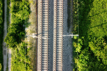 Flying over railway tracks, top view .