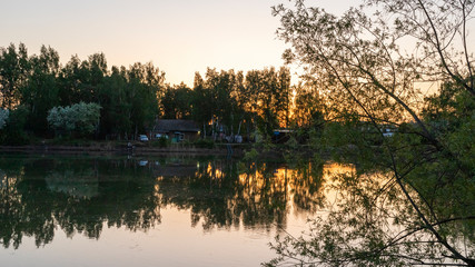 Dawn on the lake in the village