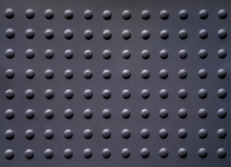 Gray circle row plastic plate abstract background.
