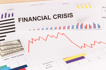 Currencies dollar and downward graphs representing financial crisis caused by coronavirus. Risk of recession around world. Covid-19