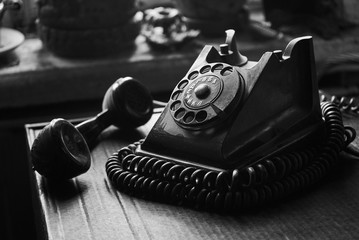 vintage black old telephone handset on black background