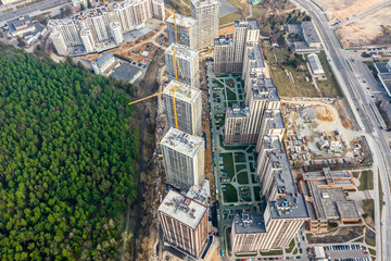 construction of new multistory residential complex. modern apartment buildings under construction. aerial view