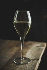 White wine on the rustic background. Selective focus. Shallow depth of field.