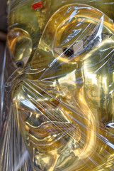 Close-up Of Golden Buddha Statue Wrapped In Plastic
