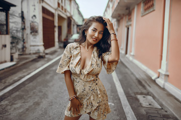 Fototapeta premium lifestyle portrait of young stylish Asian woman 