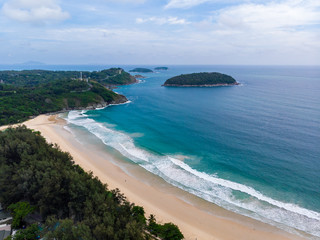 Aerial view of quiet Naiharn beach in Phuket Thailand during locked down policy due to Covid-19....
