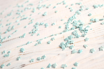Blue stars on a wooden background