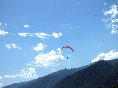 Low Angle View Of Person Paragliding Against Sky