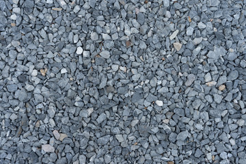 small rock, cracked rock background texture.