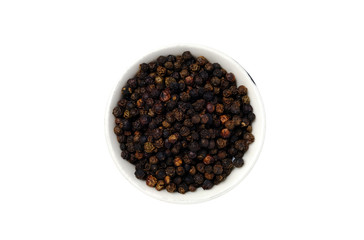 Black pepper in yellow bowl isolated on white background