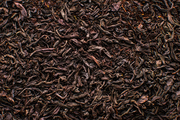 Black tea loose dried tea leaves, marco. Close-up tea leaves.