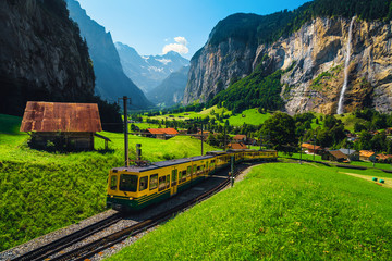 Obraz na płótnie Canvas Electric cogwheel tourist train in the Lauterbrunnen valley, Switzerland