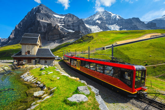 Cogwheel tourist train coming down from the mountain, Jungfraujoch, Switzerland