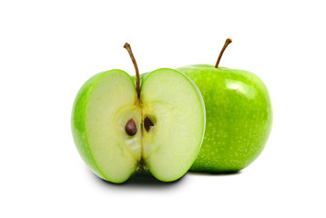 Front view of fresh green apple with slice isolated on white background.