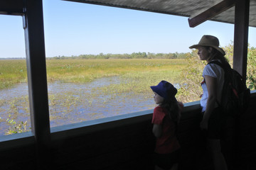 Mother and daughter looking a the landscape view of Wetland swamp Kakadu National Park Northern Territory Australia © Rafael Ben-Ari