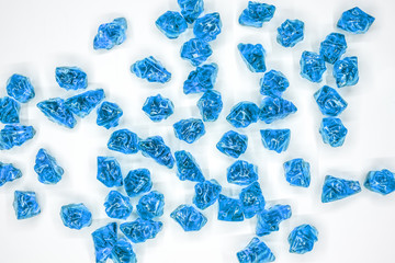 blue stones on a white background