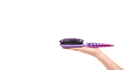 Purple hairbrush, hair care and beauty.