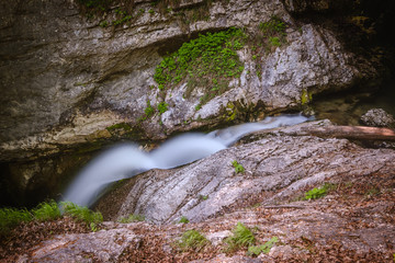 Fototapeta premium Beautiful Sum or Mostnica waterfall on the end of Voje valley in Slovenia