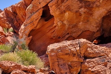 Colorful orange rock faced cliffs in the Nevada Desert