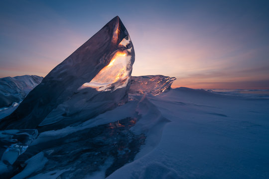 Baikal frozen lake in a morning sunrise view from Uzury bay in winter season, Siberia, Russia