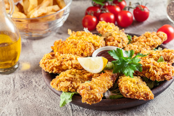Chicken strips in cornflakes breadcrumb