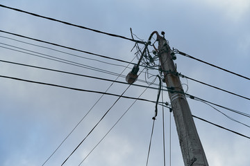 lightning electric pole with unorganized wires. electric high voltage danger. electrical pole...
