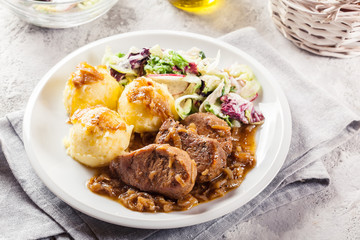 Braised pork loins with onion sauce