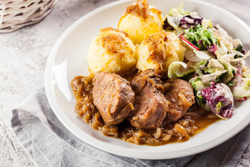 Braised pork loins with onion sauce