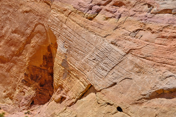 Colorful rock faces and caves in the Nevada Desert built into the sandstone