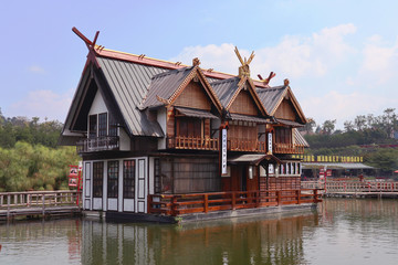 Obraz premium Floating Building Adopting Japanese Style with Floating Market Name Board in Lembang, Bandung, West Java, Indonesia.