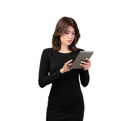 Naklejka premium Businesswoman in dress using tablet, isolated