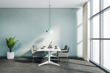 Panoramic blue dining room with grey chairs