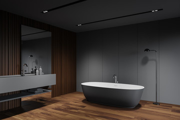 Fototapeta na wymiar Grey and wooden bathroom corner, tub and sink