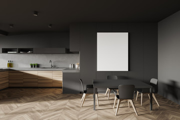 Gray and wood kitchen with table and poster
