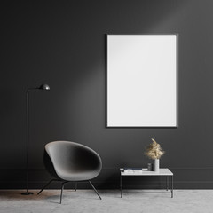 Gray armchair in living room with poster