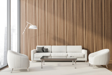 Wooden lounge with sofa and armchairs
