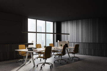 Fototapeta premium Dark wooden open space office corner