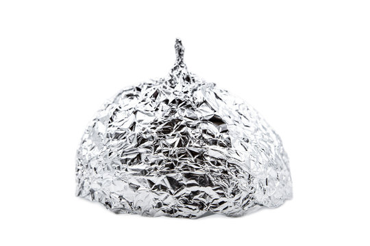 Tin foil hat isolated on white background, symbol for conspiracy theorie and mind control