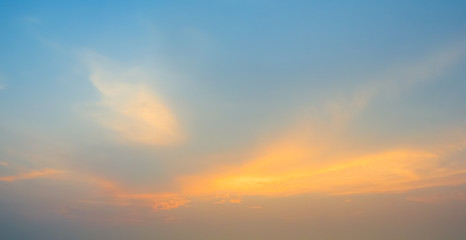 Naklejka na ściany i meble Vibrant evening sky with clouds background
