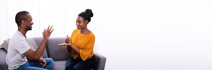 Couple Communicating With Sign Languages
