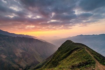 Ta Xua is a famous mountain range in northern Vietnam. All year round, the mountain rises above the clouds creating cloud inversions