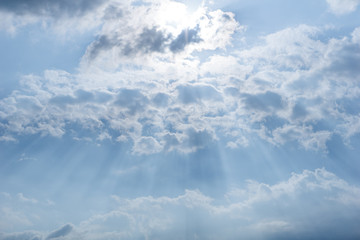 Beautiful sun shining over the cirrus cloud creates magic flares.